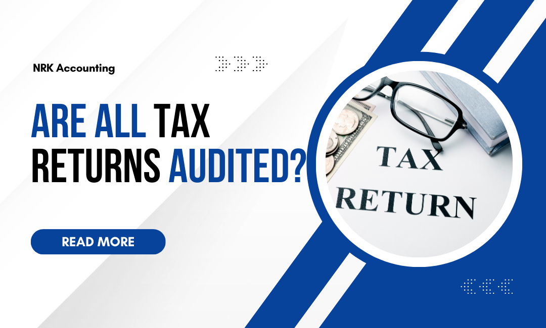 Magnifying glass over the words "Tax Return" with glasses and money nearby, highlighting tax audit concerns.