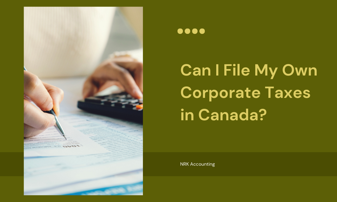 Person filling out tax forms with a calculator beside them, representing corporate tax filing in Canada.